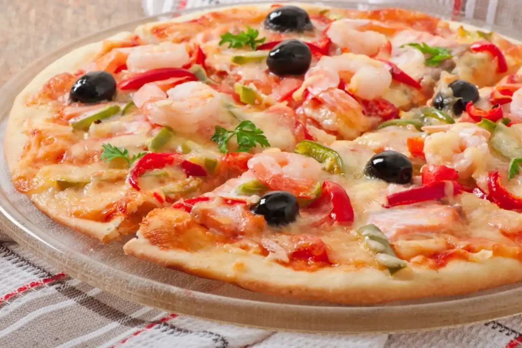 pizza con camarones típica de algunas pizzerías en Los Robles